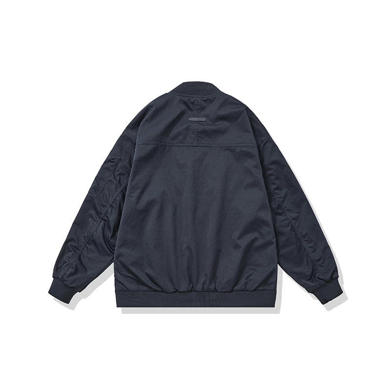 Unisex Short Cut Boxy Bomber Jacket in Utility Look with Front Zip, Flap Pockets and Ribbed Cuffs Mune Fashion
