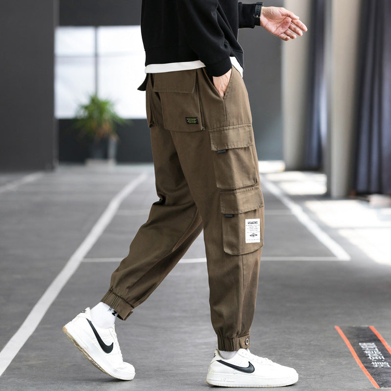 Men's nan cargo jogger pants with multiple patch pockets, elastic waistband, and gathered ankles Mune Fashion