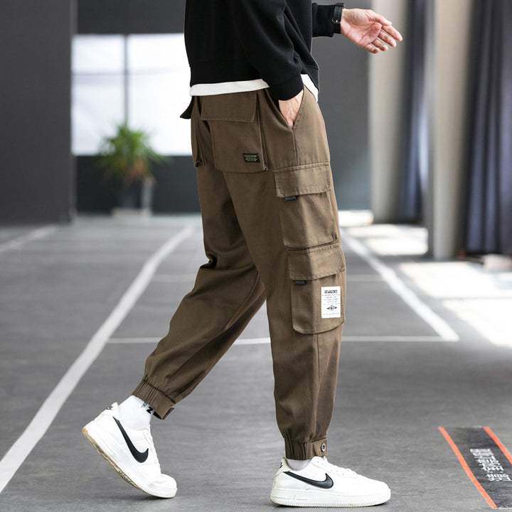 Men's nan cargo jogger pants with multiple patch pockets, elastic waistband, and gathered ankles Mune Fashion