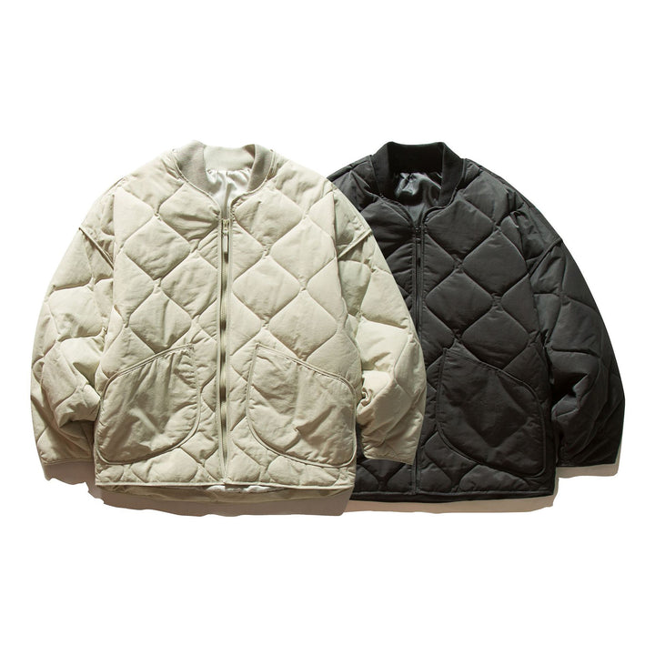 Unisex Short quilted bomber in boxy cut with ribbed collar and extra large flap pockets Mune Fashion