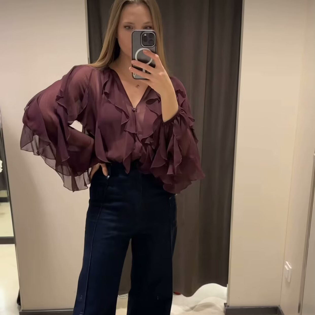Ladies sheer chiffon blouse with layered ruffles, wide balloon sleeves, and full button placket Mune Fashion