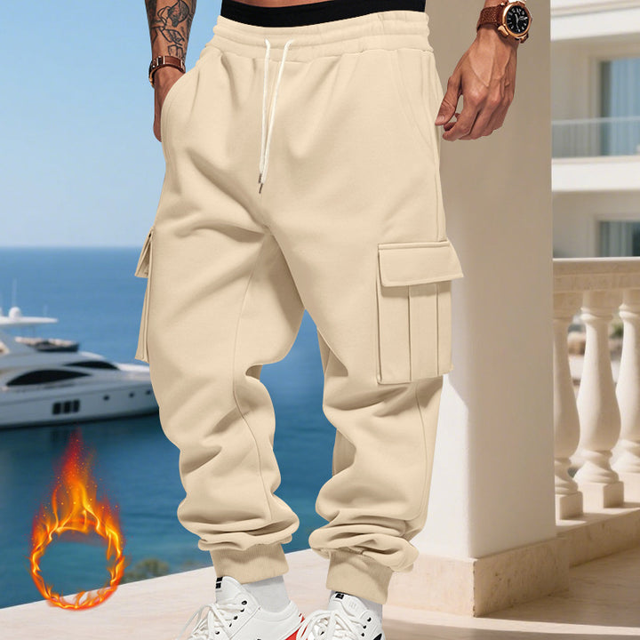 Men's nan thermal lined cargo jogging pants with elastic tunnel drawstring, large flap pockets and ribbed leg cuffs Mune Fashion