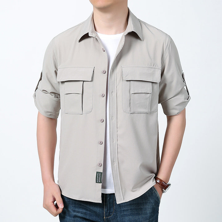 Men's functional field shirt with concealed button placket, applied multiple chest pockets and roll-up sleeves Mune Fashion