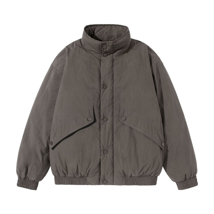 Unisex Short-cut quilted boxy blouson jacket with high stand-up collar and utility flap pockets Mune Fashion