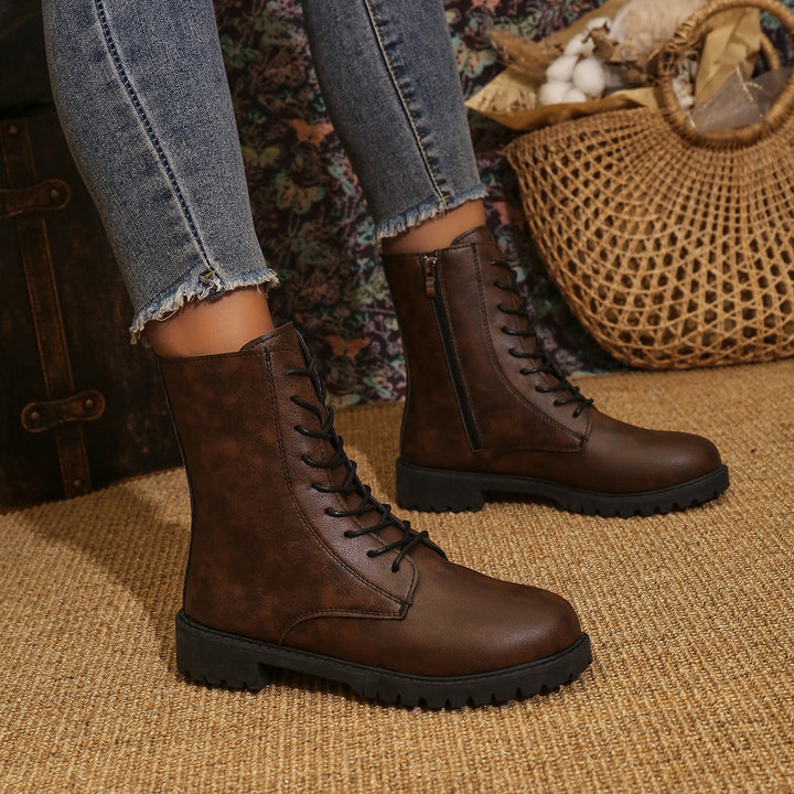 Women's  lace-up boots with side zipper and profiled rubber outsole Mune Fashion