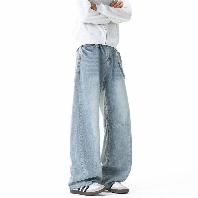 Men's wide-cut baggy jeans with high rise, knee darts, and distressed wash Mune Fashion