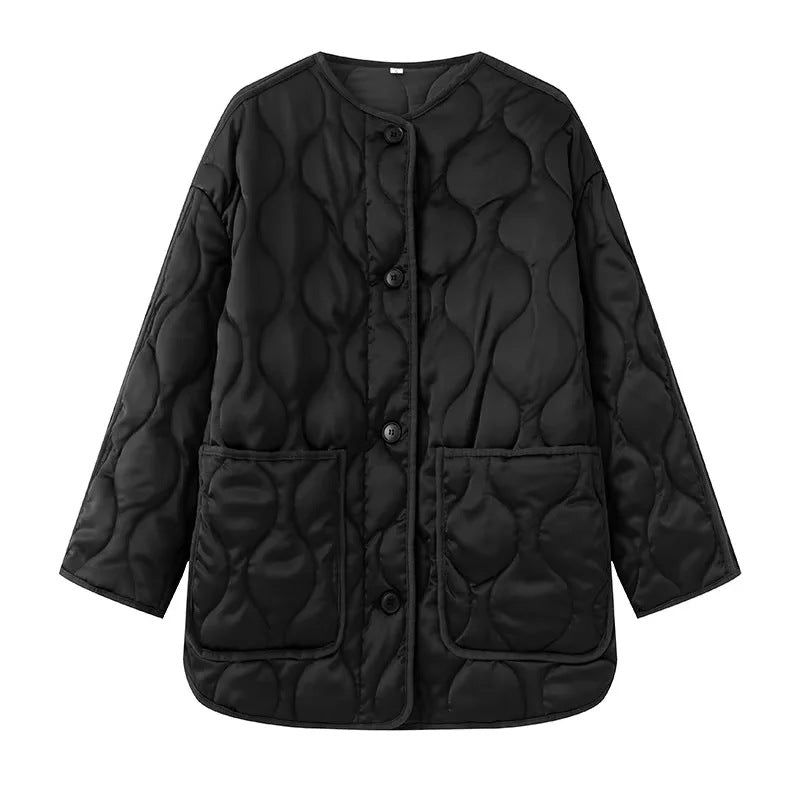 Women's quilted transitional jacket in boxy cut with round neckline, organic wave quilting, and patch pockets Mune Fashion
