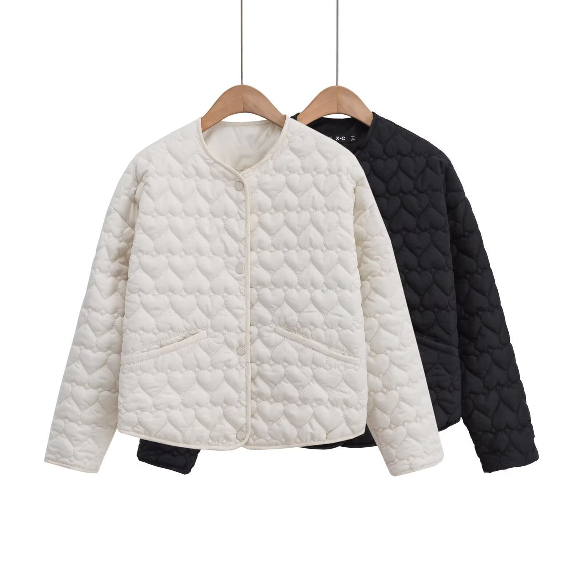 Women 100+ quilted short jacket with heart quilting, round neckline and snap buttons Mune Fashion