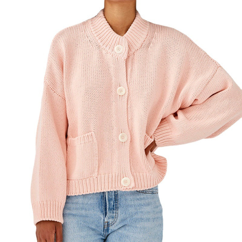 Women's Short Boxy Cardigan made of chunky knit with high button placket and side pockets Mune Fashion