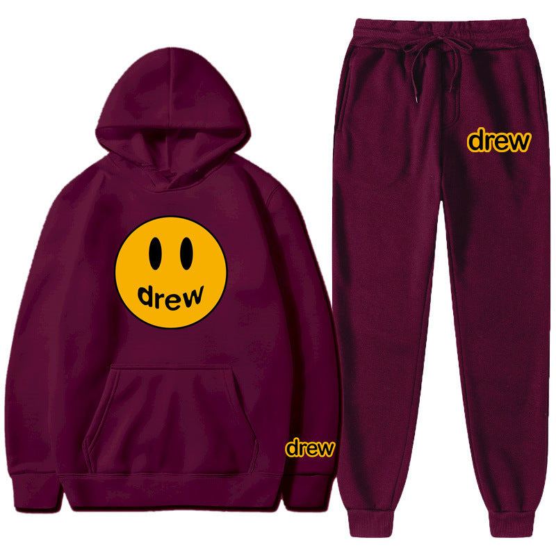 Unisex two-piece lounge set made of French terry with smiley print hoodie and tapered jogger pants Mune Fashion