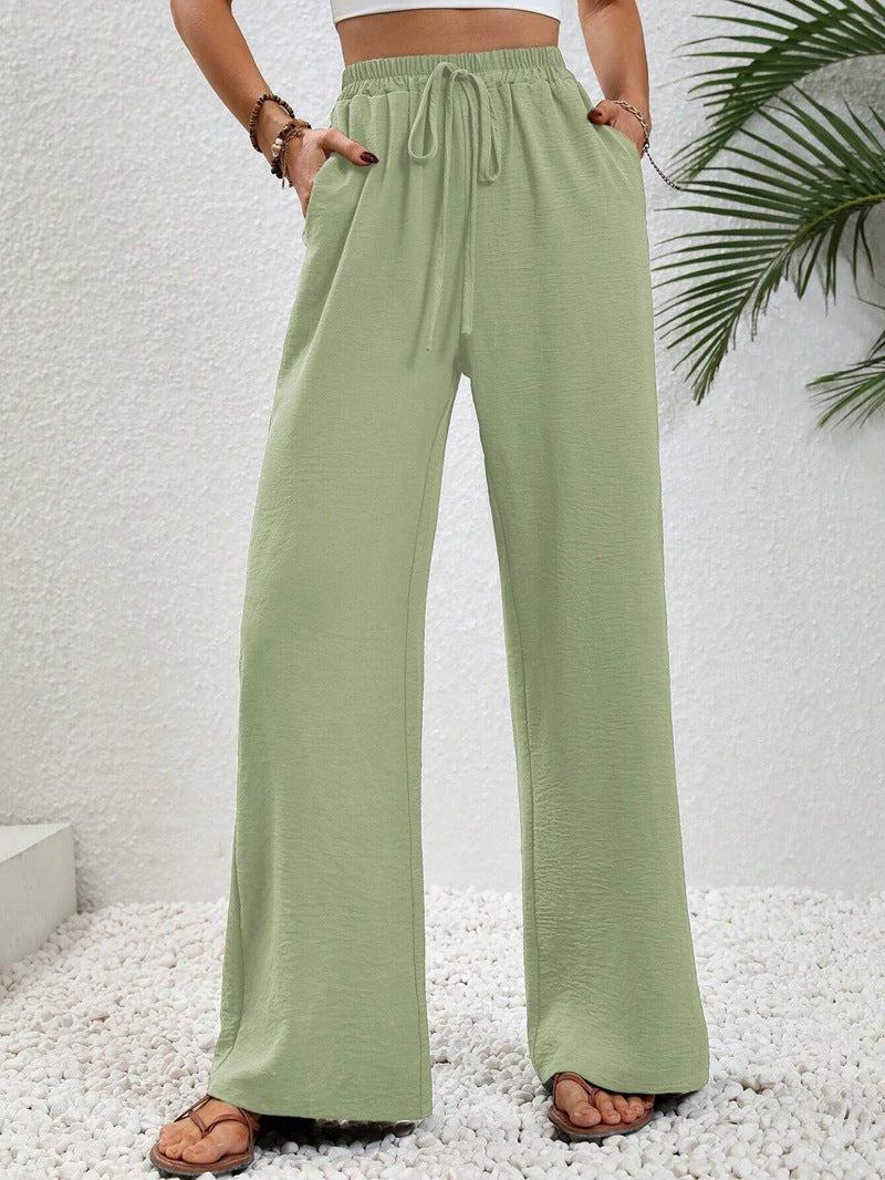 Ladies lightweight, loose-fitting beach pants with elastic waistband, drawstring and side pockets Mune Fashion