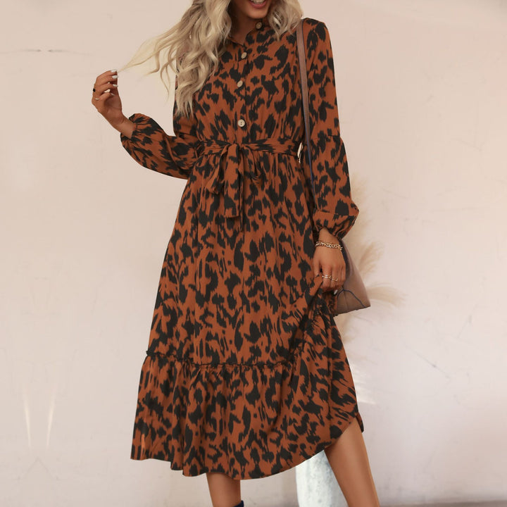 Women’s midi dress with animal print, button placket, waist belt and tiered skirt Mune Fashion