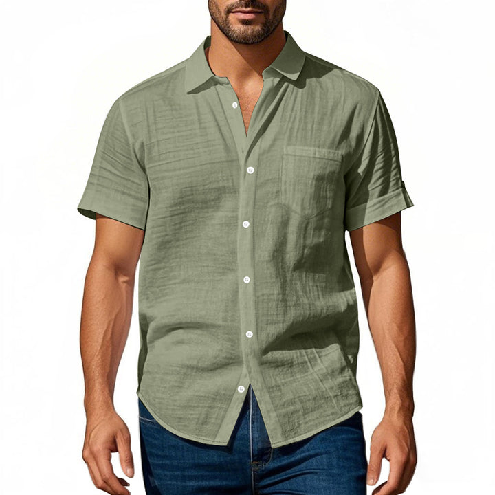 Men's short-sleeved casual shirt made of linen blend with chest pocket and rounded hem Mune Fashion