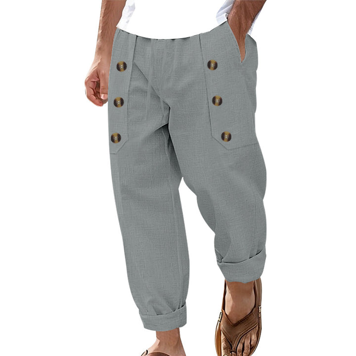 Men's loose linen trousers with decorative button stripes, rolled ankle cuffs, and side pockets Mune Fashion