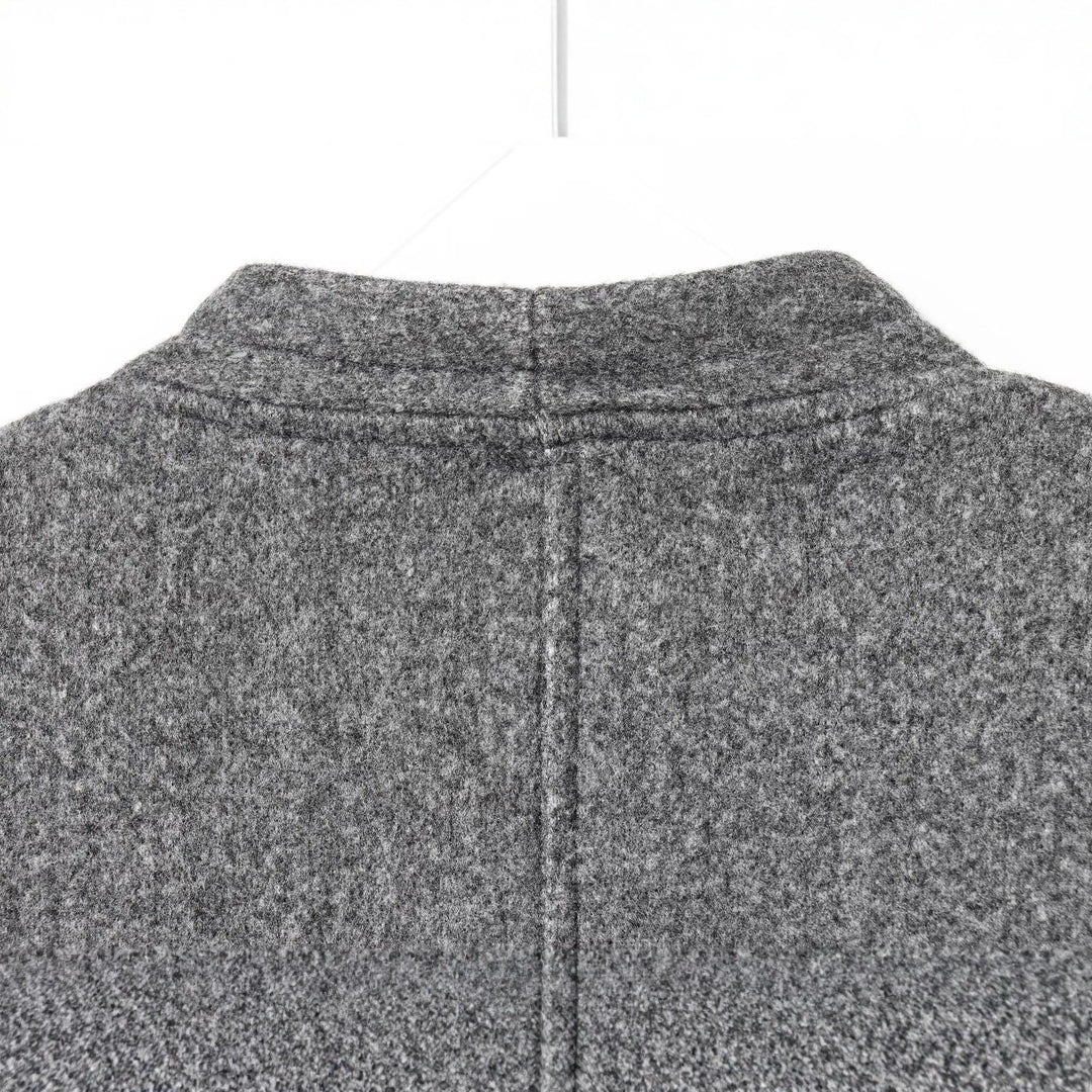 Women’s short jacket made of wool blend with round neck and decorative button placket Mune Fashion