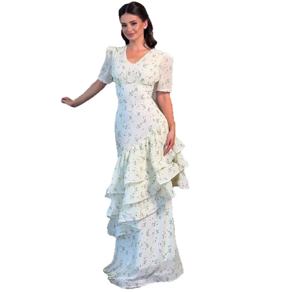 Women’s maxi dress in vintage-romantic style with asymmetric ruffles and puff sleeves Mune Fashion