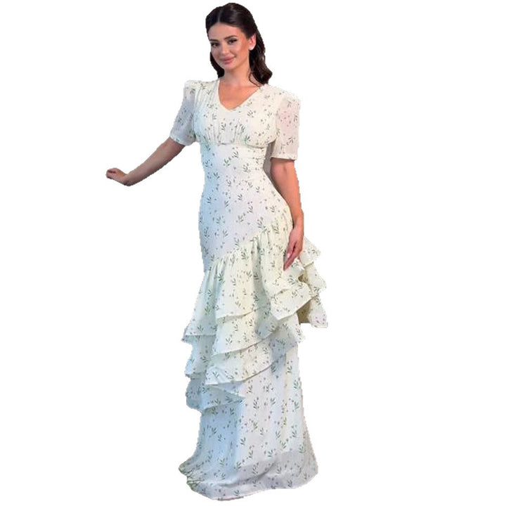 Women’s maxi dress in vintage-romantic style with asymmetric ruffles and puff sleeves Mune Fashion