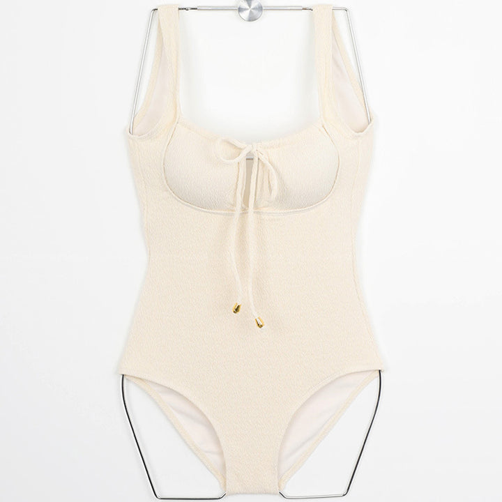 Women’s one-piece swimsuit with high-neck top design and fashionable lace-up detail Mune Fashion