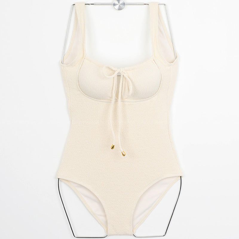 Women’s one-piece swimsuit with high-neck top design and fashionable lace-up detail Mune Fashion