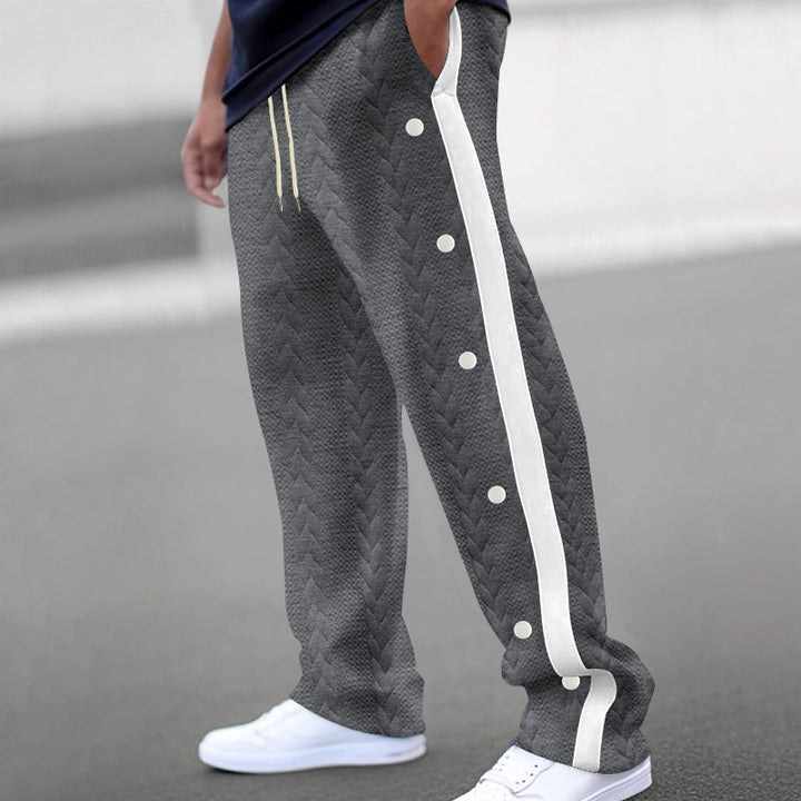 Men's quilted casual pants with continuous snap button placket and contrast stripes Mune Fashion