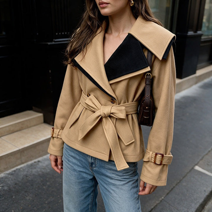 Women's short-cut wool blend coat with wide lapel collar, tie belt, and buckle cuffs Mune Fashion