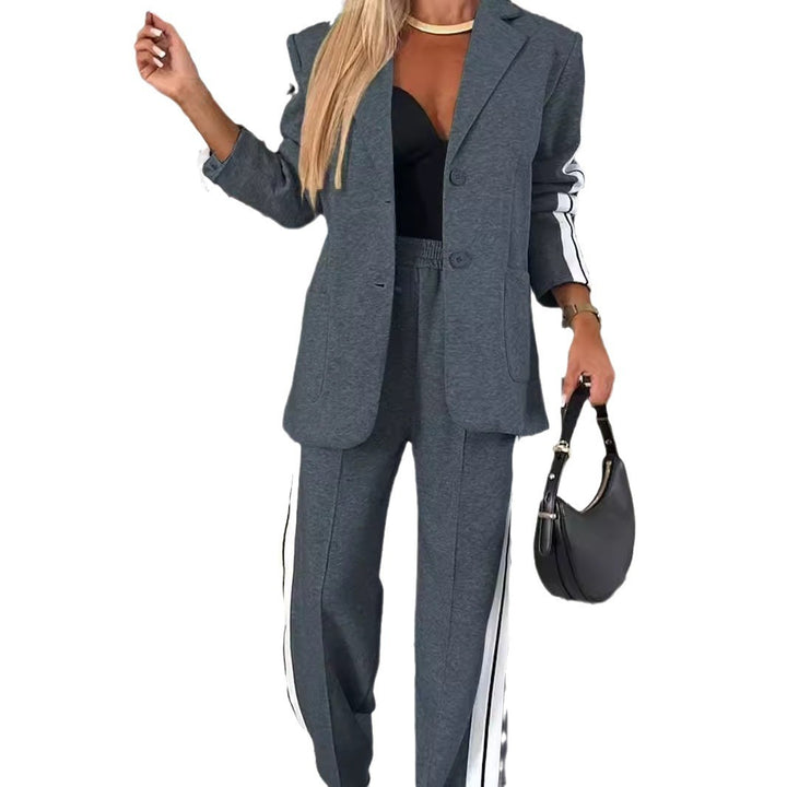 Women's elegant blazer set in sports chic with contrasting side stripes and elasticated waistband trousers Mune Fashion