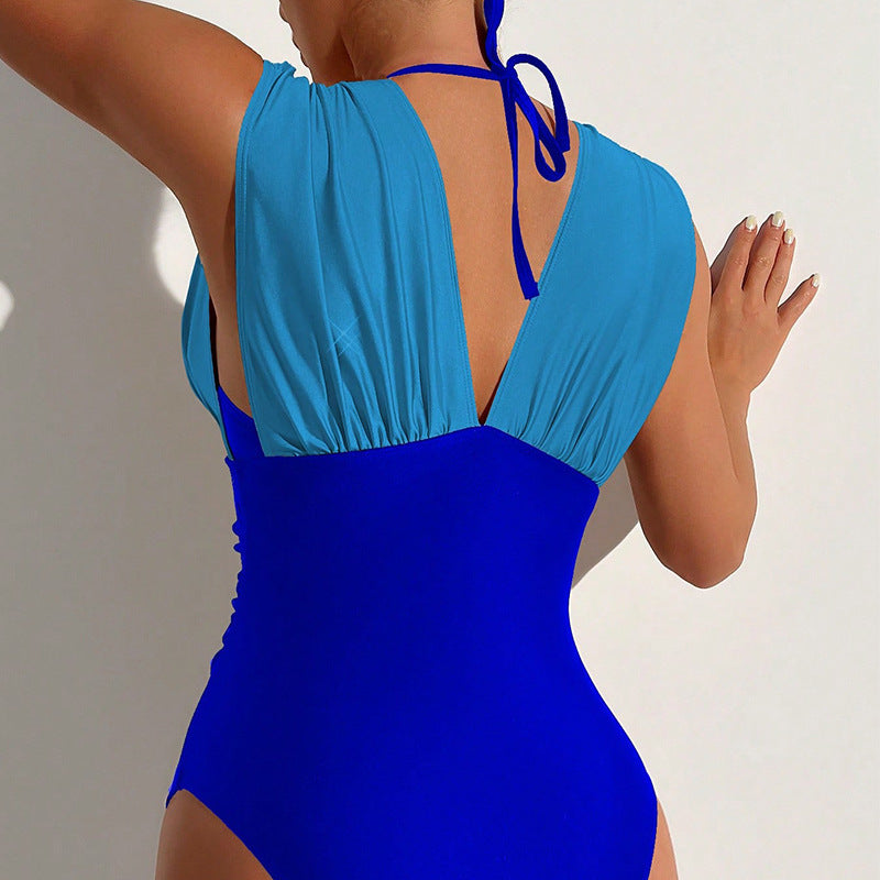 Women's one-piece swimsuit with deep V-neck and elegant waist belt Mune Fashion