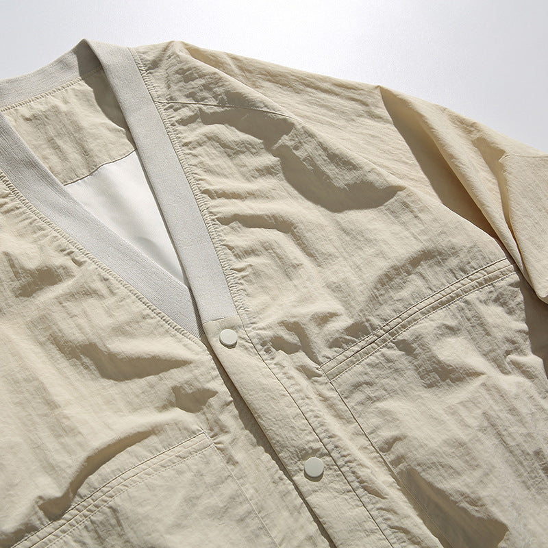 Unisex Oversized Lightweight Transitional Jacket with V-Neck and Snap Button Placket Mune Fashion