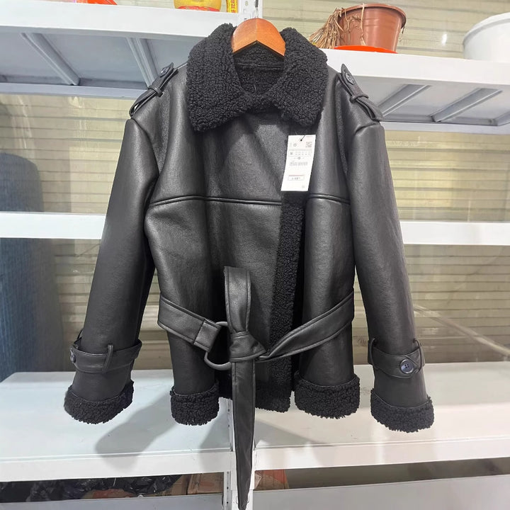 Women's short oversized faux leather coat with teddy collar, shawl collar, and wrap belt Mune Fashion
