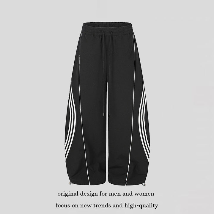 Women's Wide Tech Material Palazzo Pants with Drawstring Waistband, Reflective Side Stripes and Adjustable Cord Hem