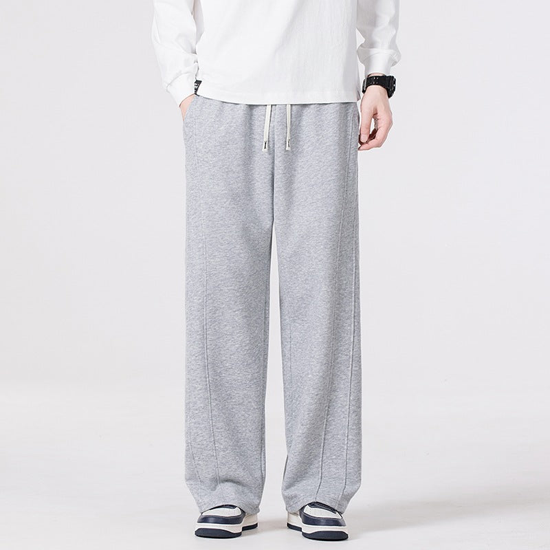 Men's leisure joggers in oversized cut with elastic drawstring waistband & distinctive side seam Mune Fashion