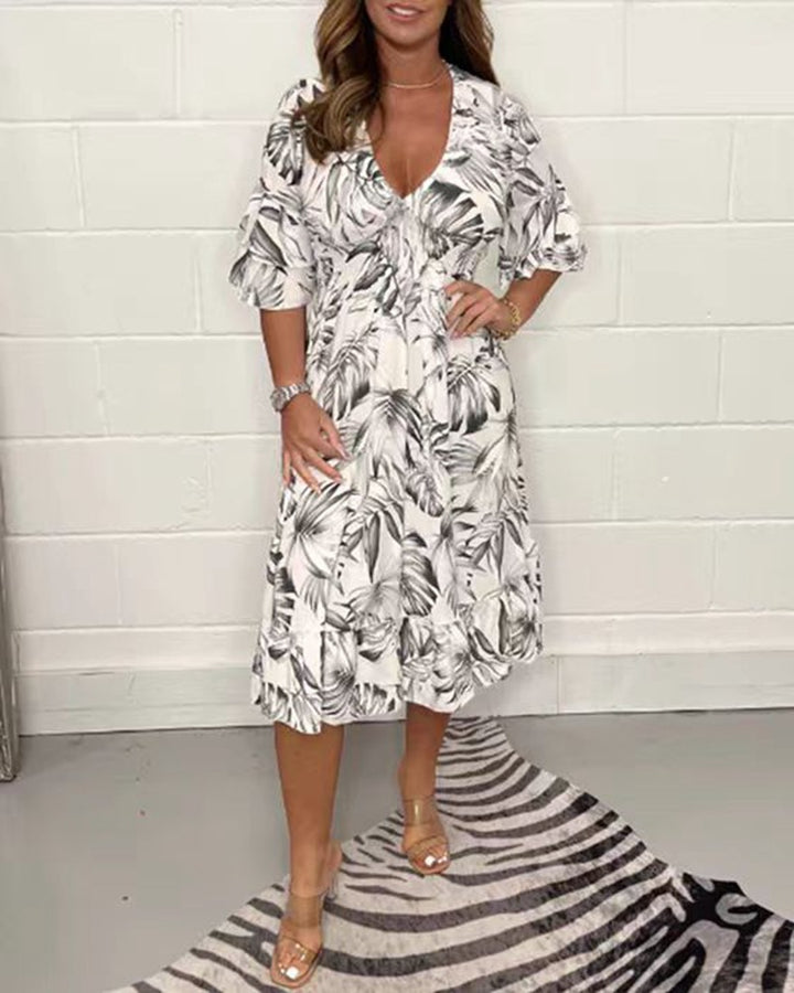 Women nan midi dress with leaf print, V-neck, gathered empire waist and ruffled tiers Mune Fashion