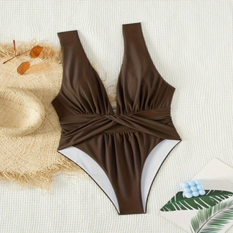 Women's one-piece swimsuit with flowing wrap design and high leg cut Mune Fashion