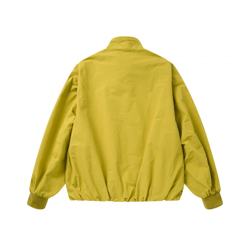 Unisex Lightweight Boxy Outdoor Jacket in Track Style with High Stand-Up Collar, Zipper Pockets and Elastic Hem Mune Fashion