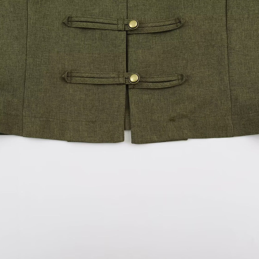 Women’s short jacket in Mandarin style with decorative toggle closures and tailored seam line Mune Fashion