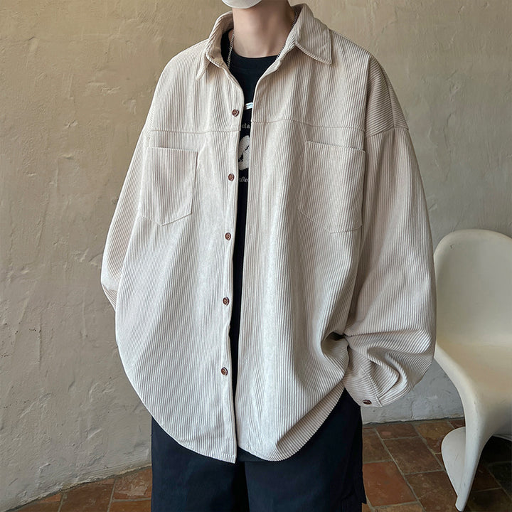 Men's oversized cord shirt jacket with stitched breast pockets, rounded hem, and loose silhouette Mune Fashion