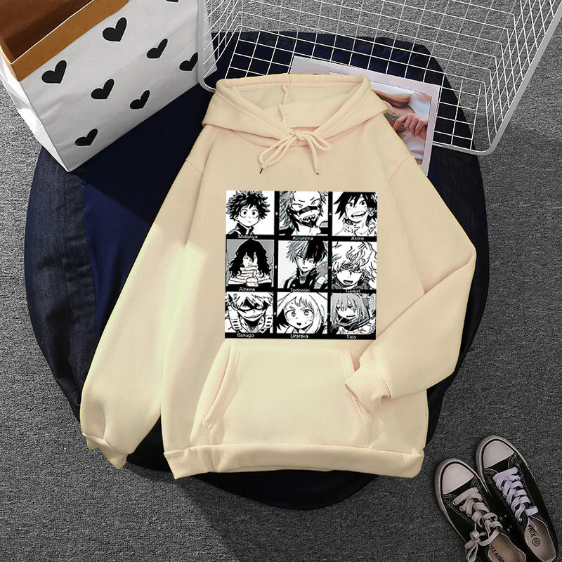 Unisex hoodie with square manga character collage, slightly oversized fit and kangaroo pocket Mune Fashion