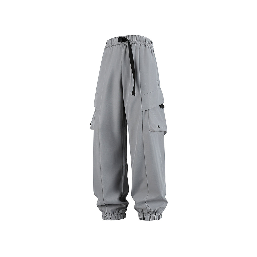 Men's loose cargo jogger pants with elastic drawstring waistband, multiple flap pockets, and ribbed ankles Drune