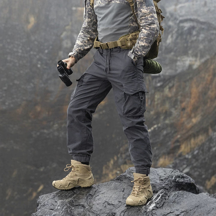 Men's Durable Twill Cargo Pants in Jogger Cut with Drawstring Waist, Applied Flap Pockets and Ribbed Cuffs Mune Fashion