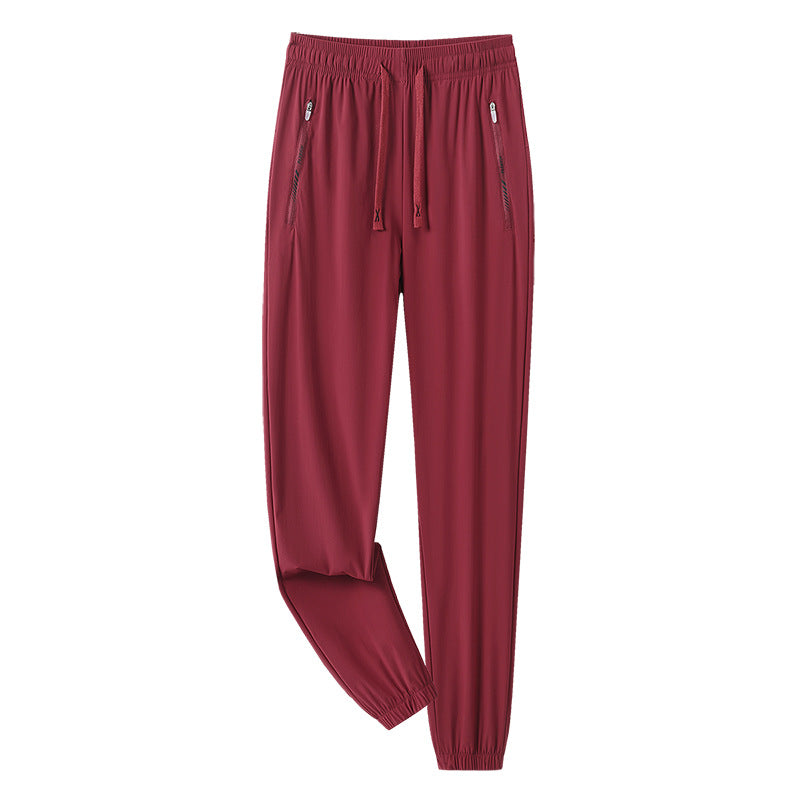 Men's sporty jogging pants with adjustable waistband and zippered pockets Mune Fashion