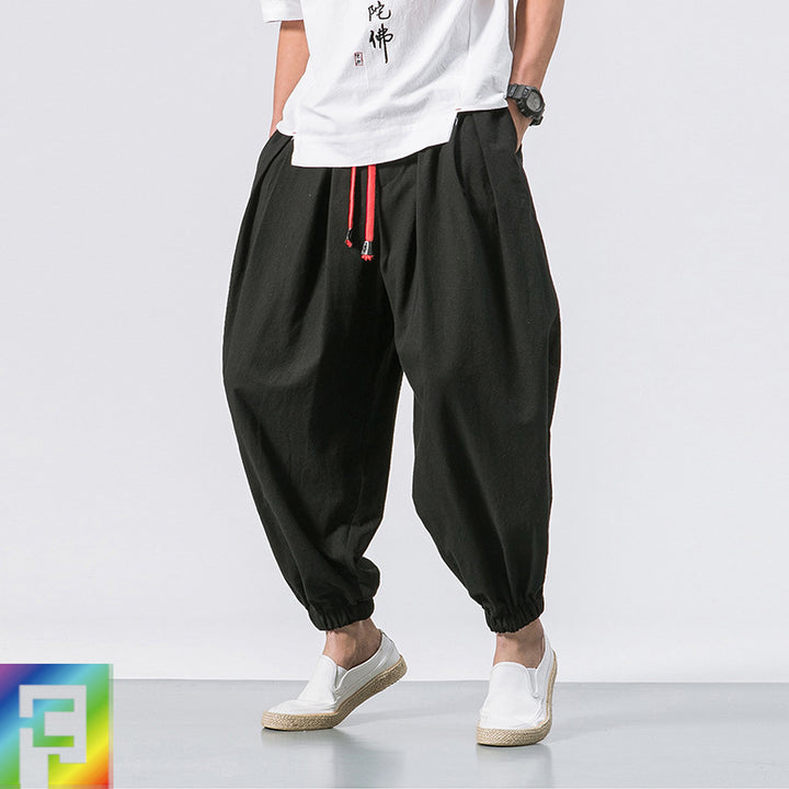 Men's unusual harem-style balloon pants with pleats, elastic waistband, and drawstring Mune Fashion