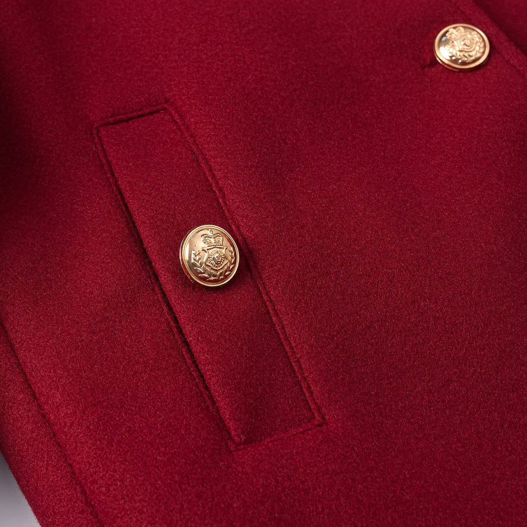 Women’s short jacket in boxy cut with round neck and gold decorative buttons Mune Fashion