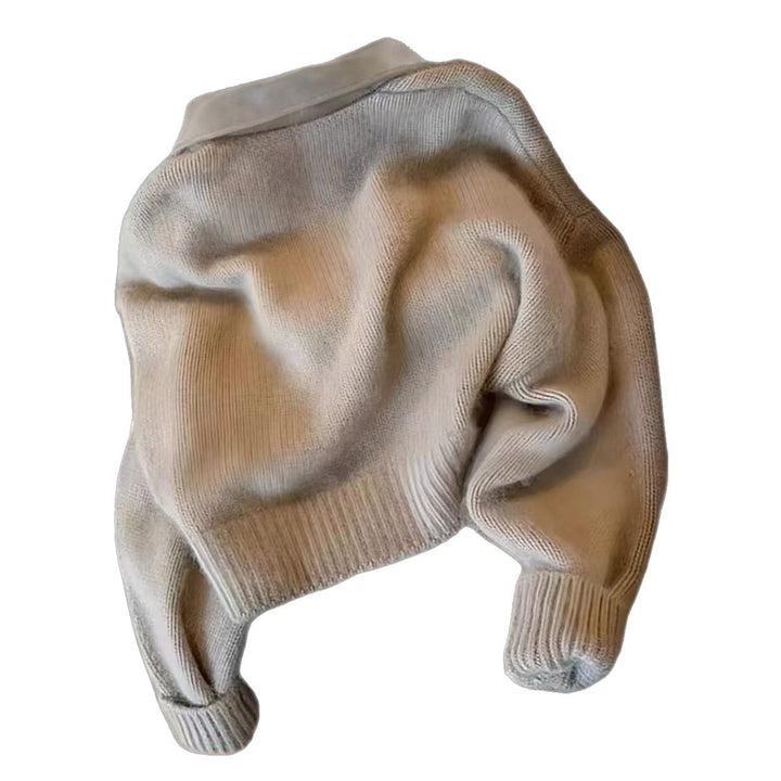 Women's short-cut knitted blouse with faux leather collar and gold-colored metal zipper Mune Fashion