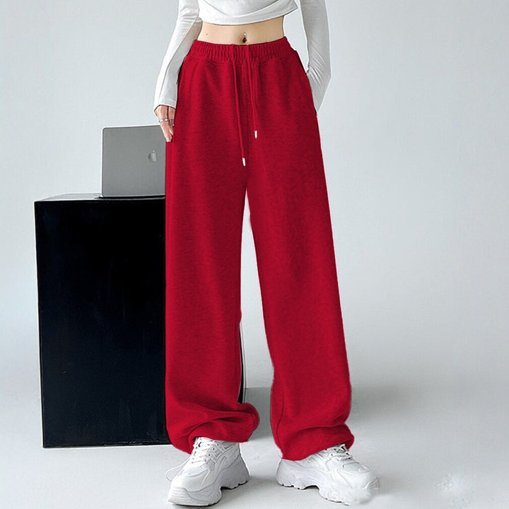 Ladies Nan extra wide palazzo sweatpants with high comfort waistband, side pockets, slit at hem and drawstring Mune Fashion
