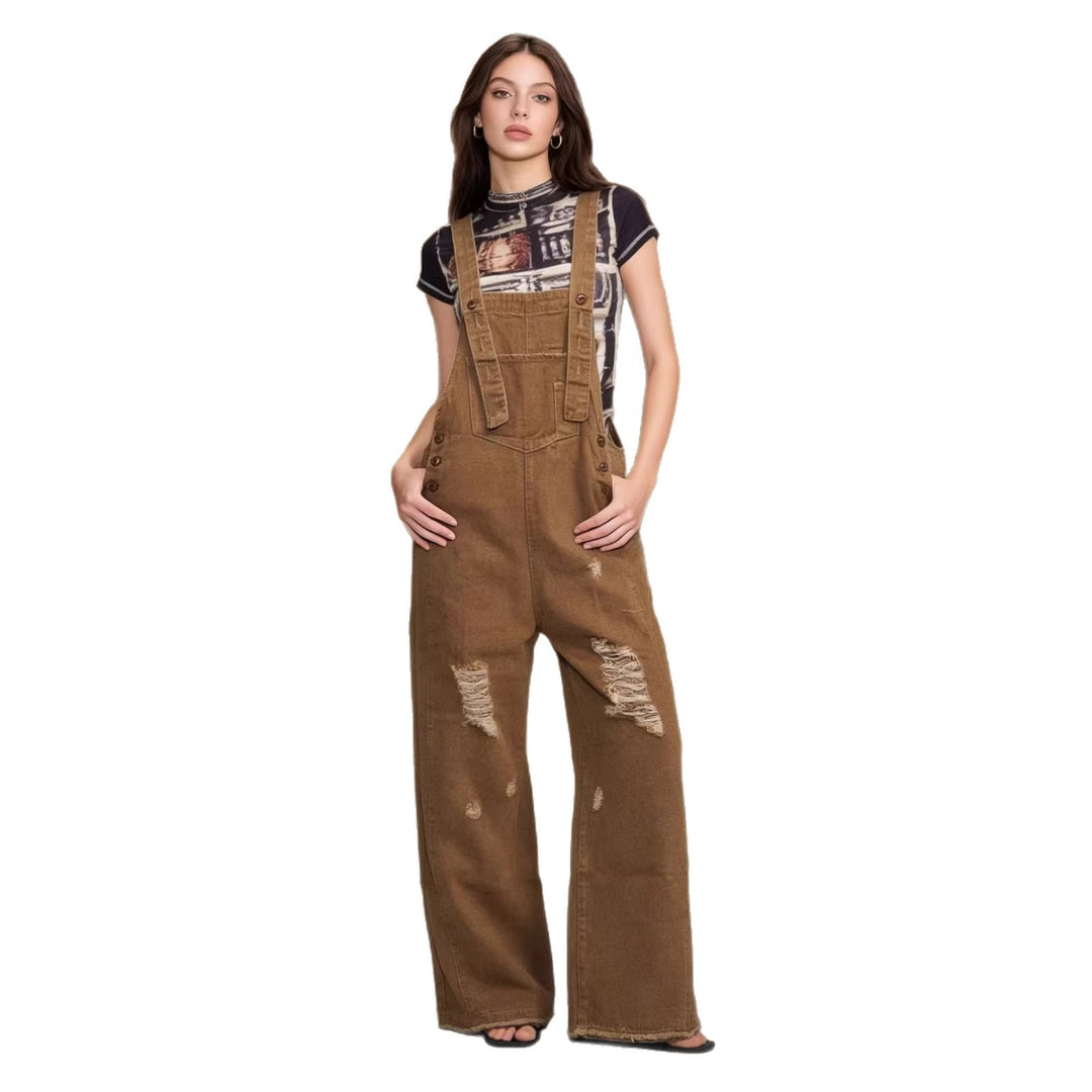 Women's modern baggy overalls made of pigment-dyed stretch denim with adjustable straps and visible rips Mune Fashion