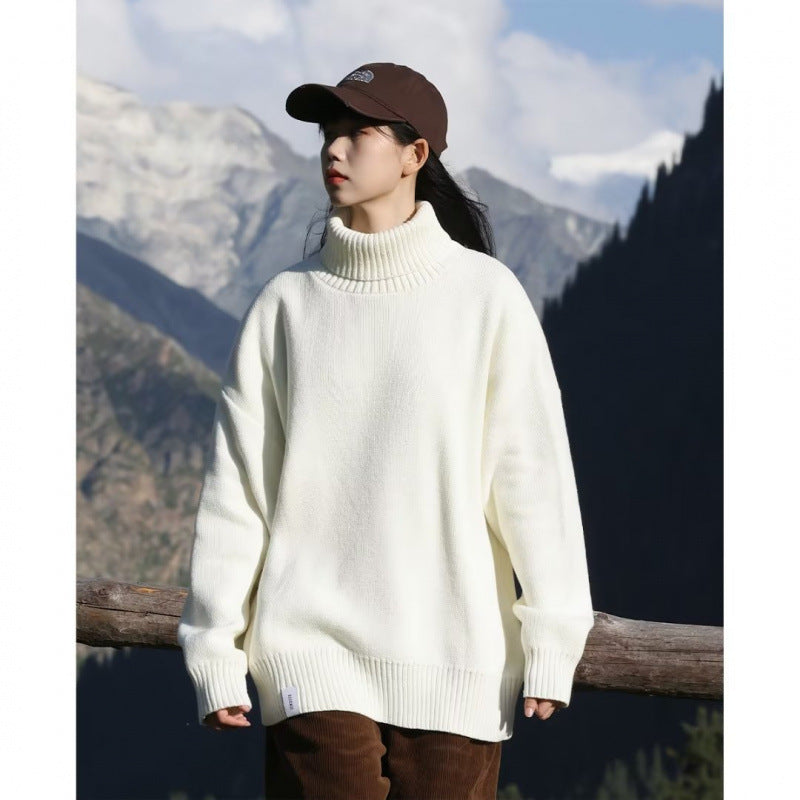 Women Oversized Turtleneck Sweater made of soft cotton blend with ribbed cuffs and extended hem Mune Fashion