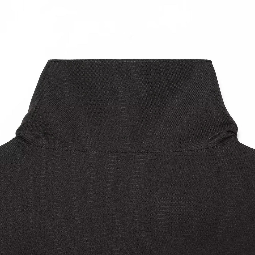 Women's windbreaker jacket in blouson cut with stand-up collar, drawstring and tulle hem.