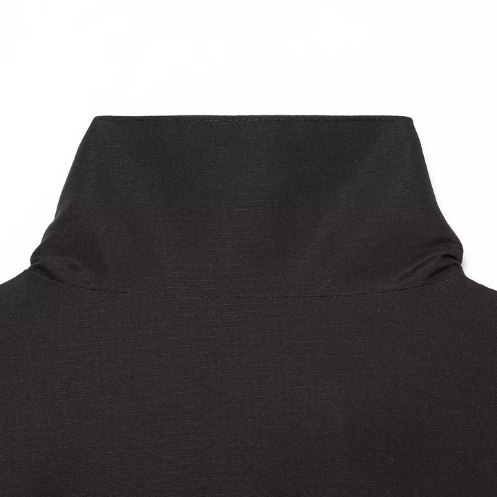 Women's windbreaker jacket in blouson cut with stand-up collar, drawstring and tulle hem.