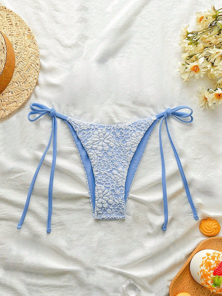 Women's bikini bottom with floral lace applications Mune Fashion