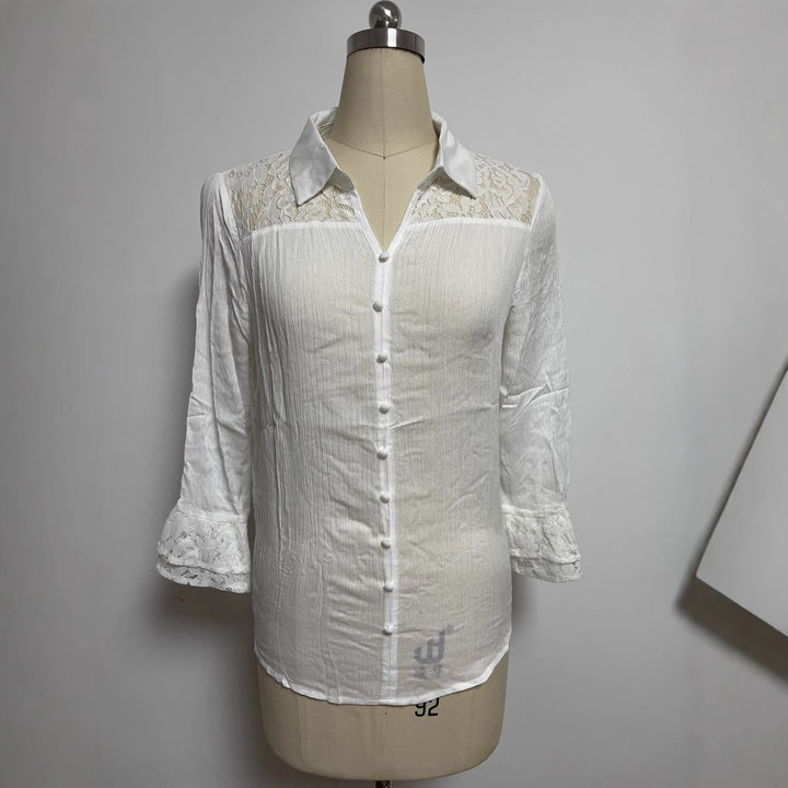 Ladies' semi-transparent crepe blouse with lace yoke, fabric-covered buttons, and three-quarter flounce sleeves Mune Fashion